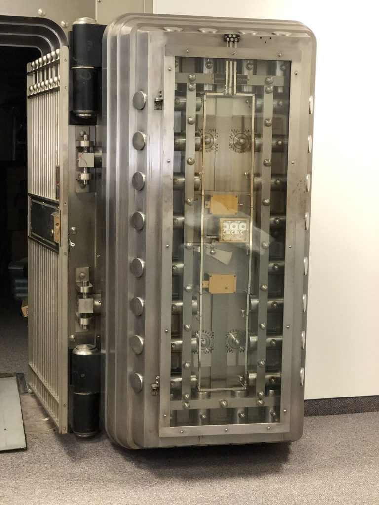 Crypto Custody Standards Move Toward Bank Practice secured vault door with digital lock