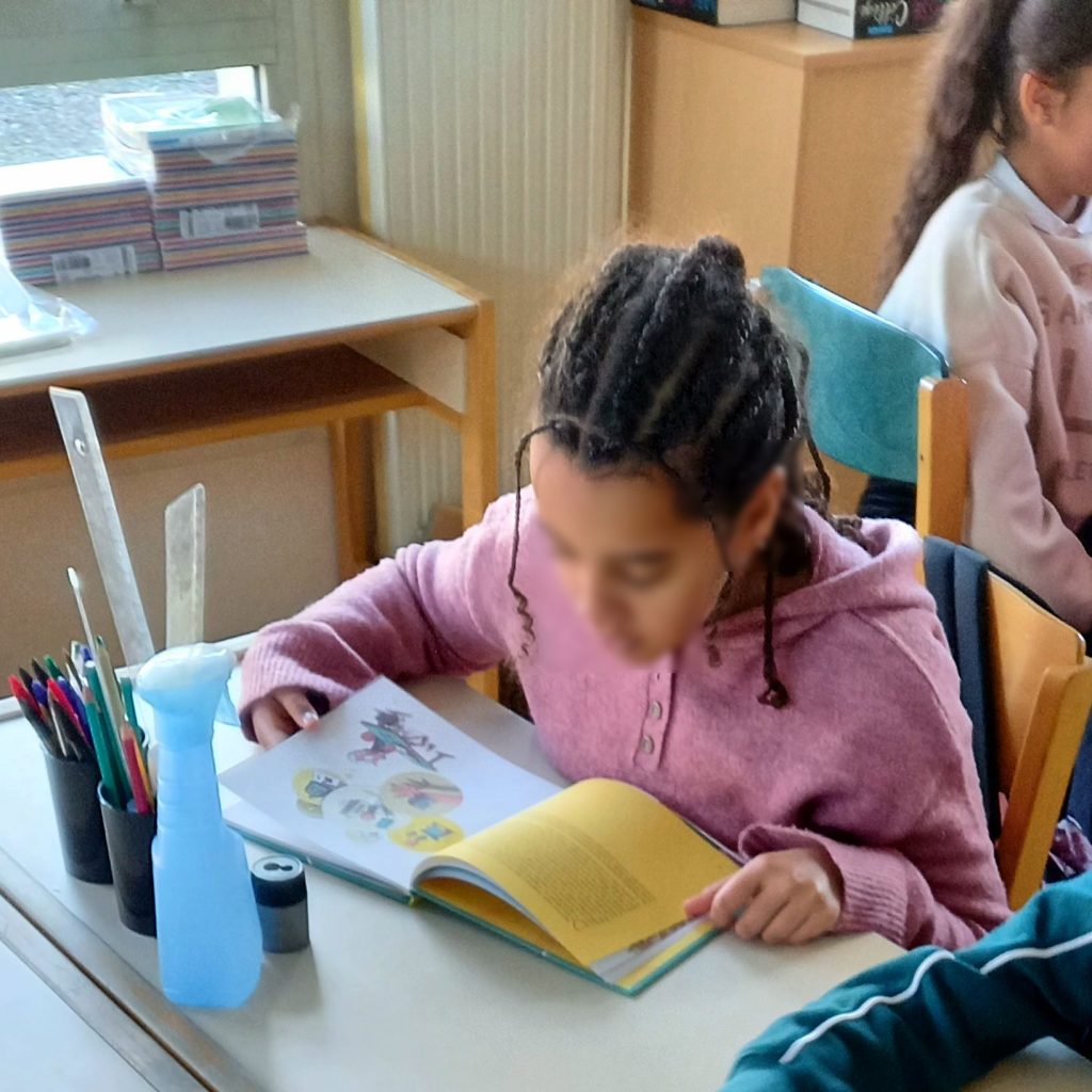 Phone-Free Classrooms: What a 16,000-Student Study Means for Your Family Students learning in a phone-free classroom with smartphones put away, illustrating a study on classroom bans and academic performance